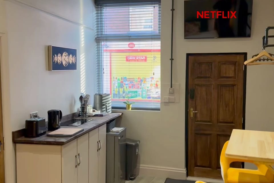 Well equipped kitchenette with TV