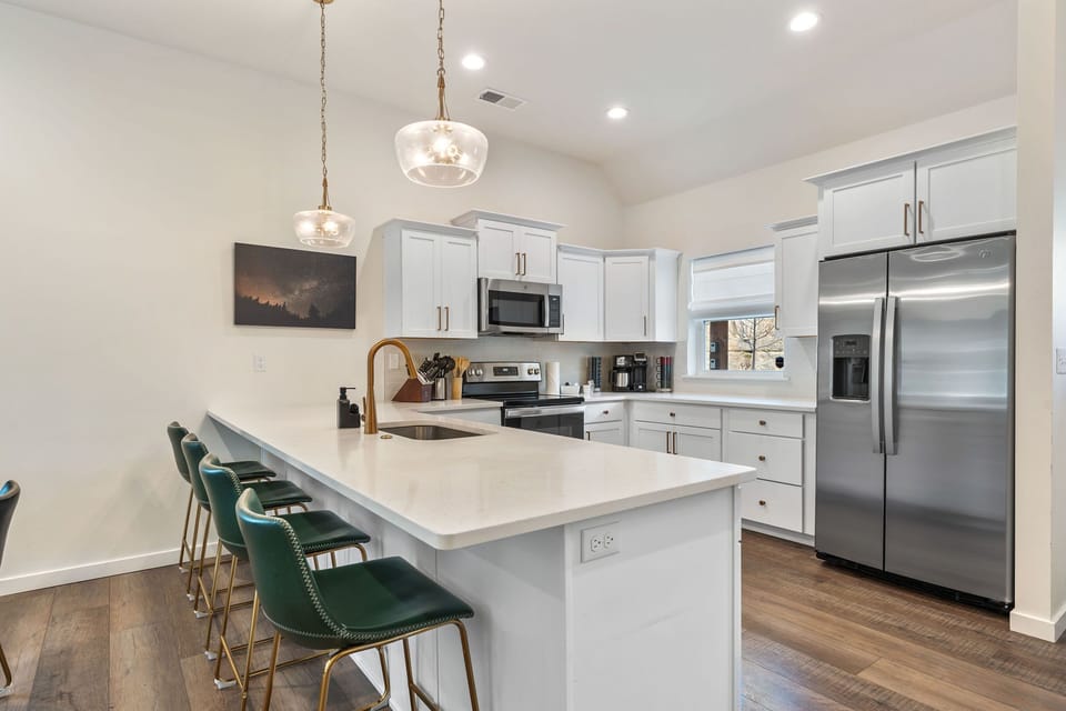 Prepare your favorite meals in a fully stocked kitchen equipped with everything you need for your stay.
