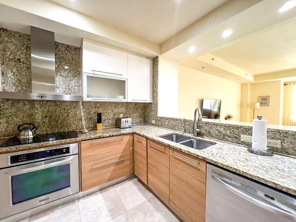 Kitchen: Flush stovetop and conventional oven; Dishwasher