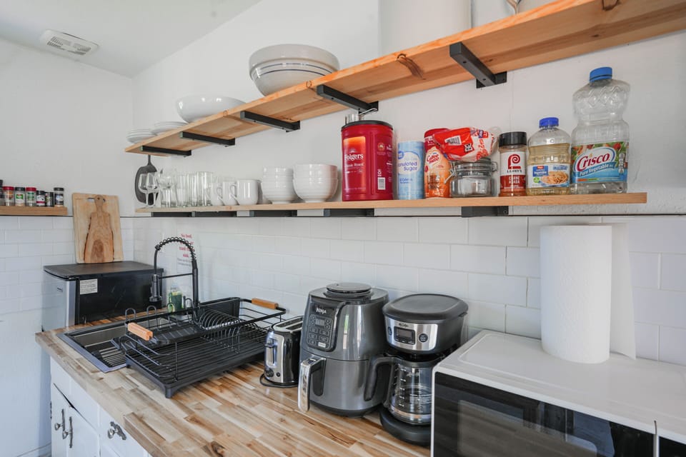 Well-stocked kitchen with appliances and tools for simple, stress-free meals.