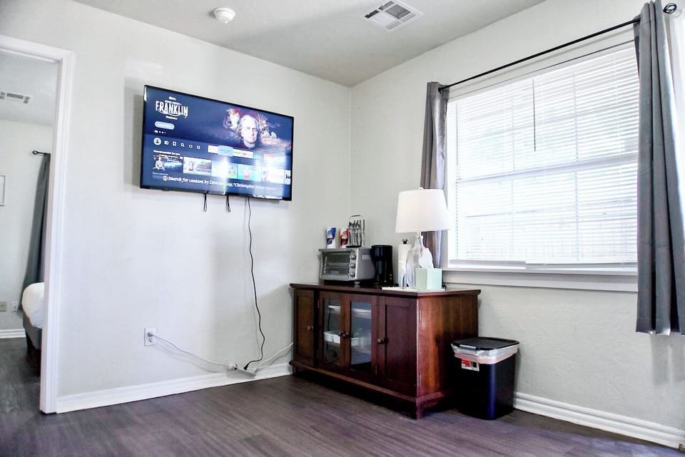 A living room where modern furnishings meet homely comfort, perfect for cozy evenings