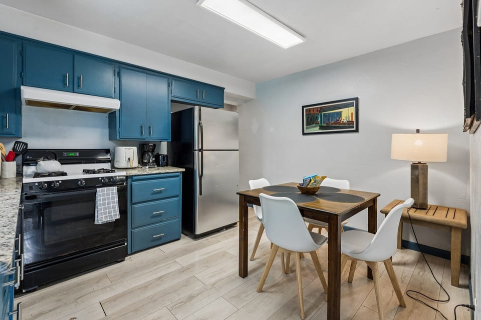 Cook with ease using the full stove, oven, microwave, and essentials.