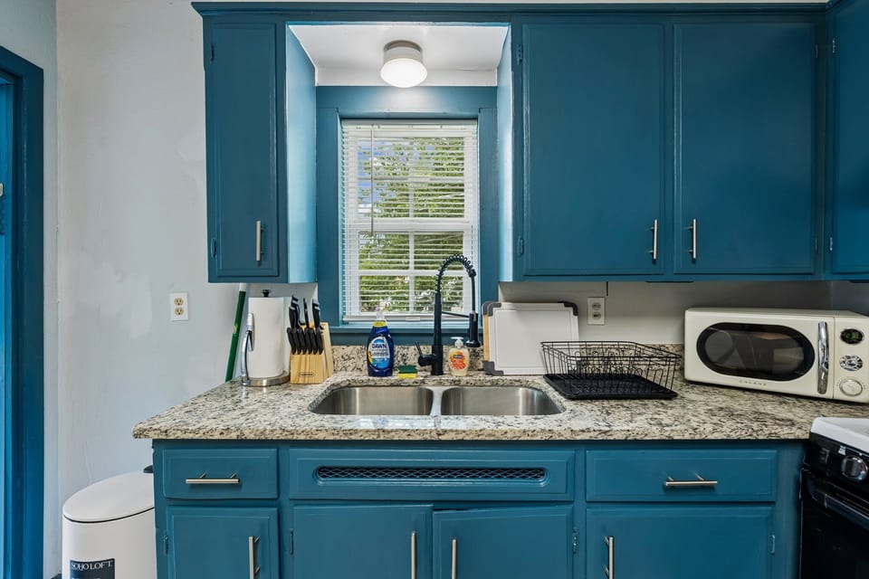 A clean kitchen and dining area made for longer, easier stays.