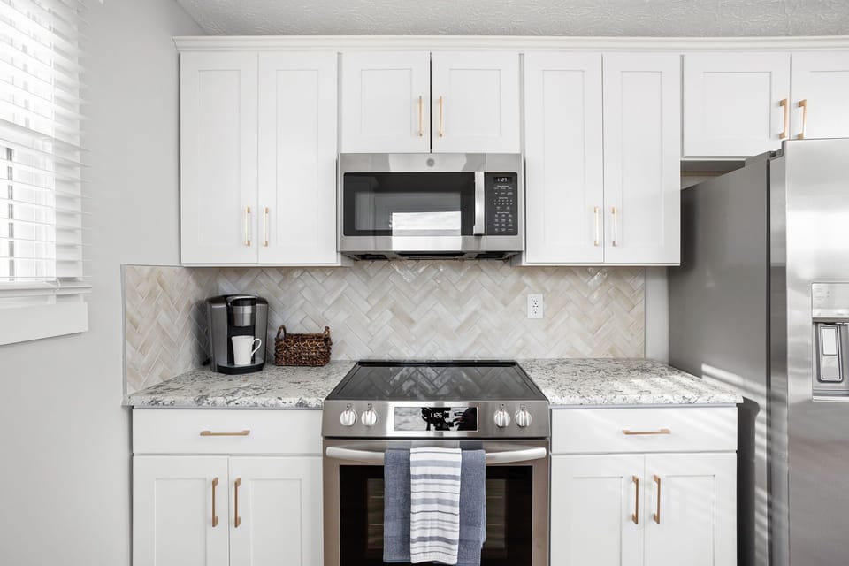 Brand new stainless steel appliances await your use.