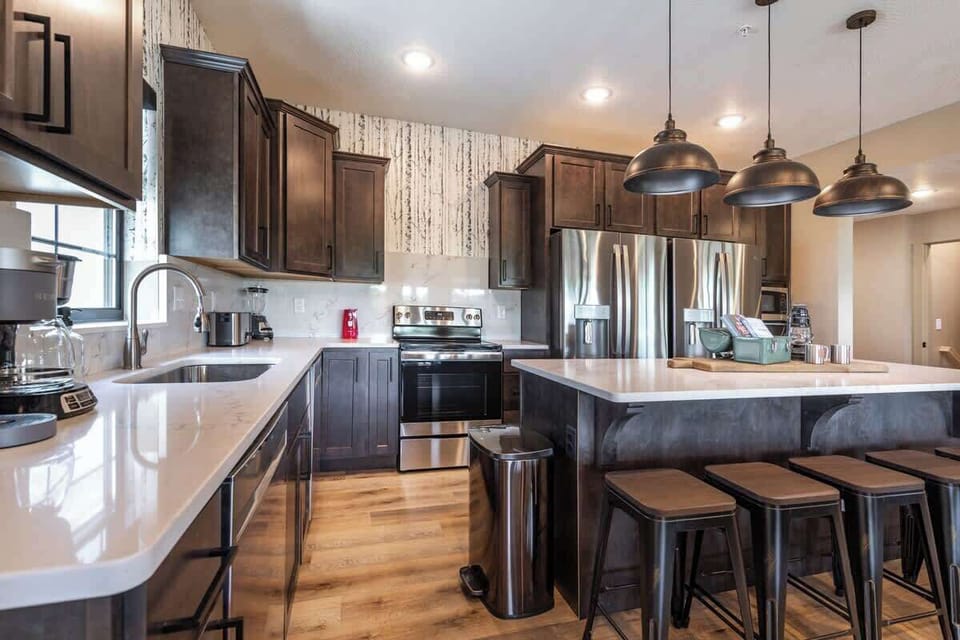There's no such thing as too many cooks in our kitchen. More than enough space to mingle and connect while cooking!