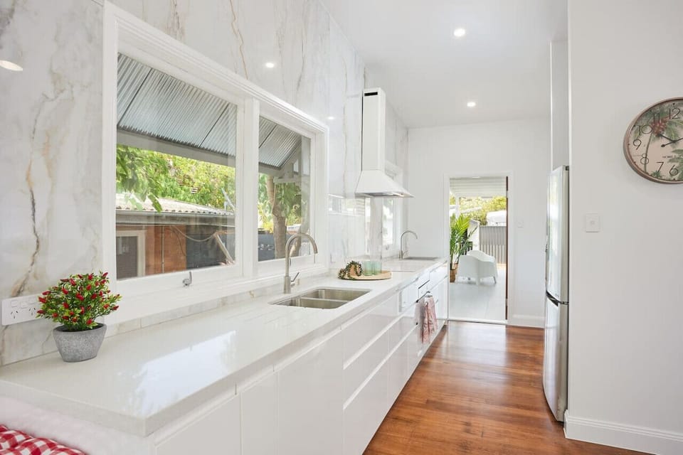 Kitchen stocked with everything you need. Huge fridge with ice maker