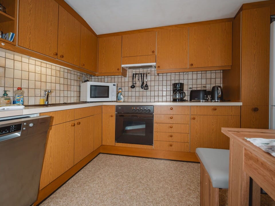 Countertop, Kitchen, Cabinetry, Flooring, Kitchen Appliance, Wood, Interior Design, Major Appliance, Floor, Sink