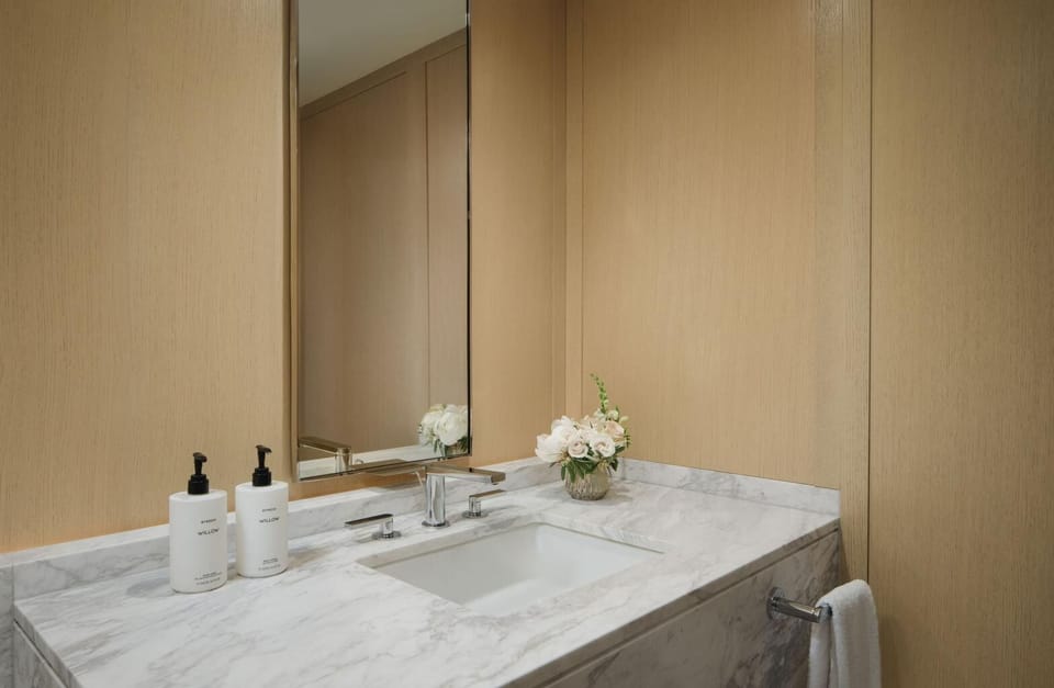 Enjoy simple luxuries with spotless stone counters and fresh amenities.
