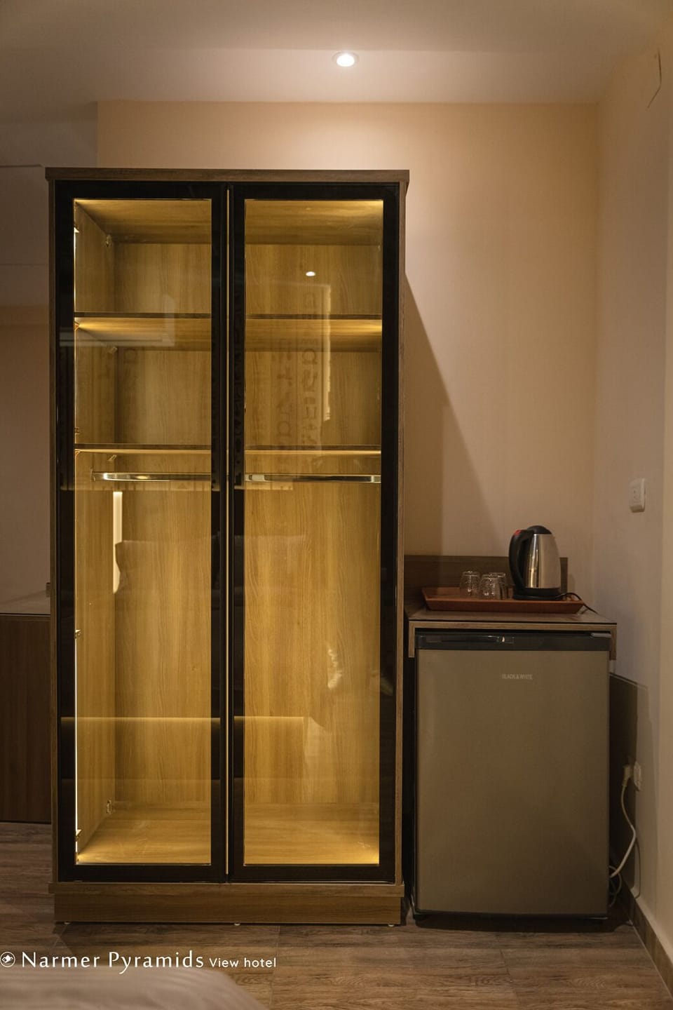 Illuminated wardrobe.
Minibar
Heating Kettle and tea tray