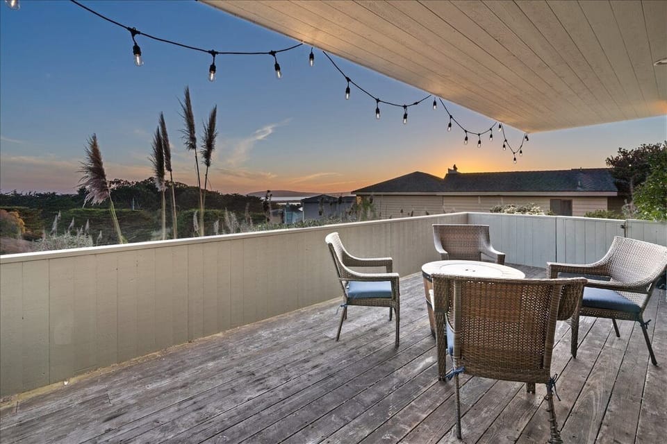 Balcony with a cozy table, perfect for relaxing and enjoying the surrounding nature.