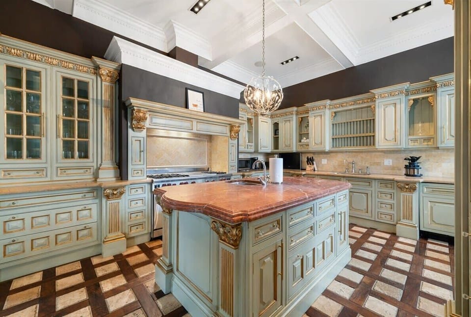 Bright, clean kitchen designed for everyday cooking, w/ plenty of prep space and a functional layout.