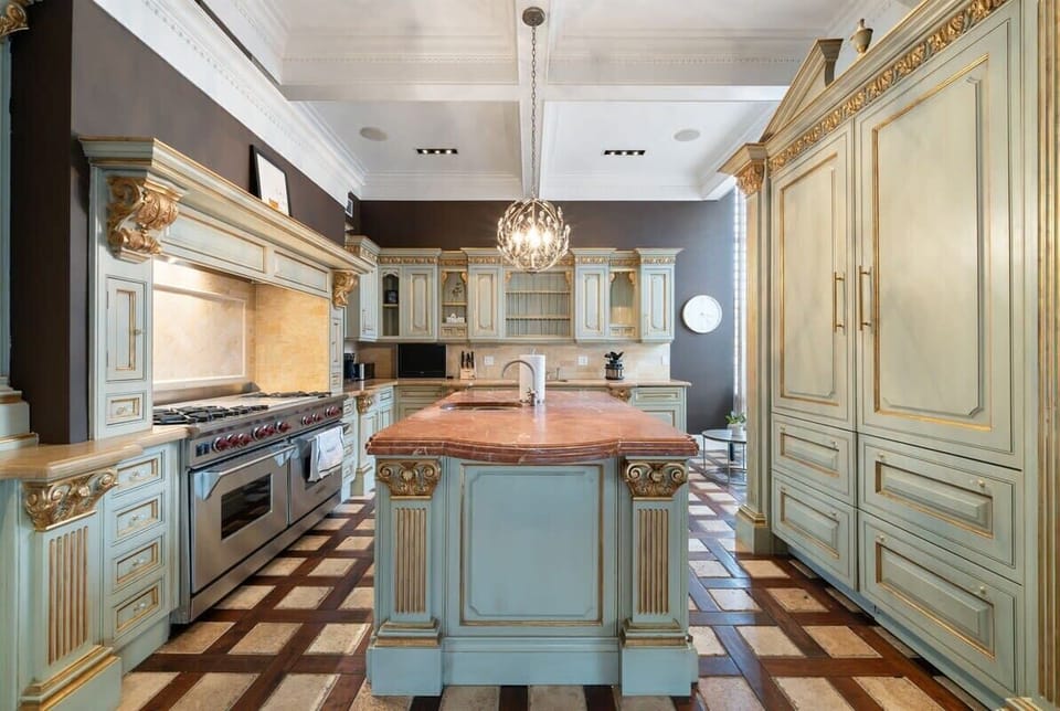 Functional kitchen layout w/ generous counter space and a bright, polished look.