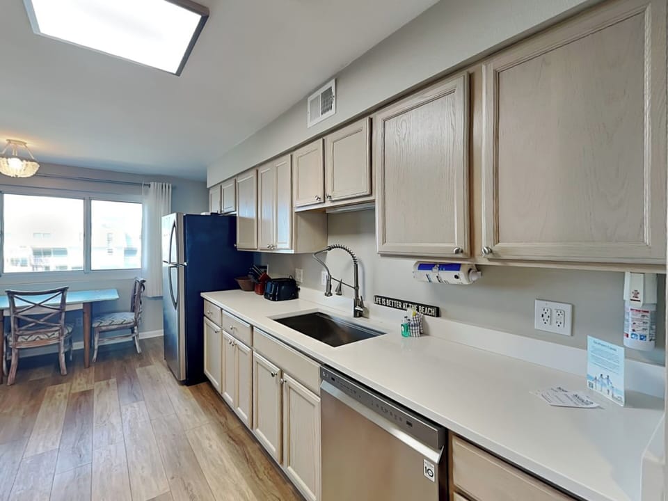 Fully Equipped Kitchen with Stainless Steel Appliances - First Floor