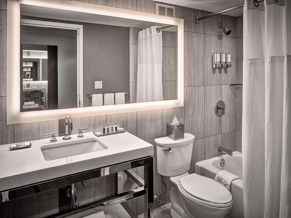 Full bathroom with a shower/tub. Basic toiletries and towels are provided