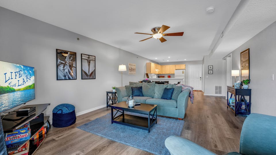 Clean, family friendly living room and kitchen.