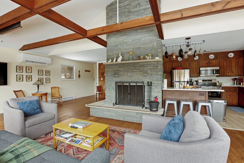 Main Floor Open Concept Living Room - Mountain Views - Woodburning Fireplace
