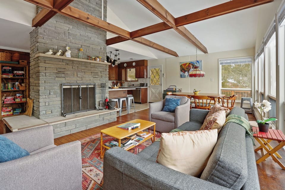 Main Floor Open Concept Living Room - Mountain Views - Woodburning Fireplace