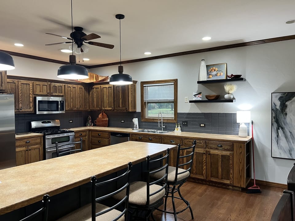Spacious kitchen that has been well stocked for any size gathering.