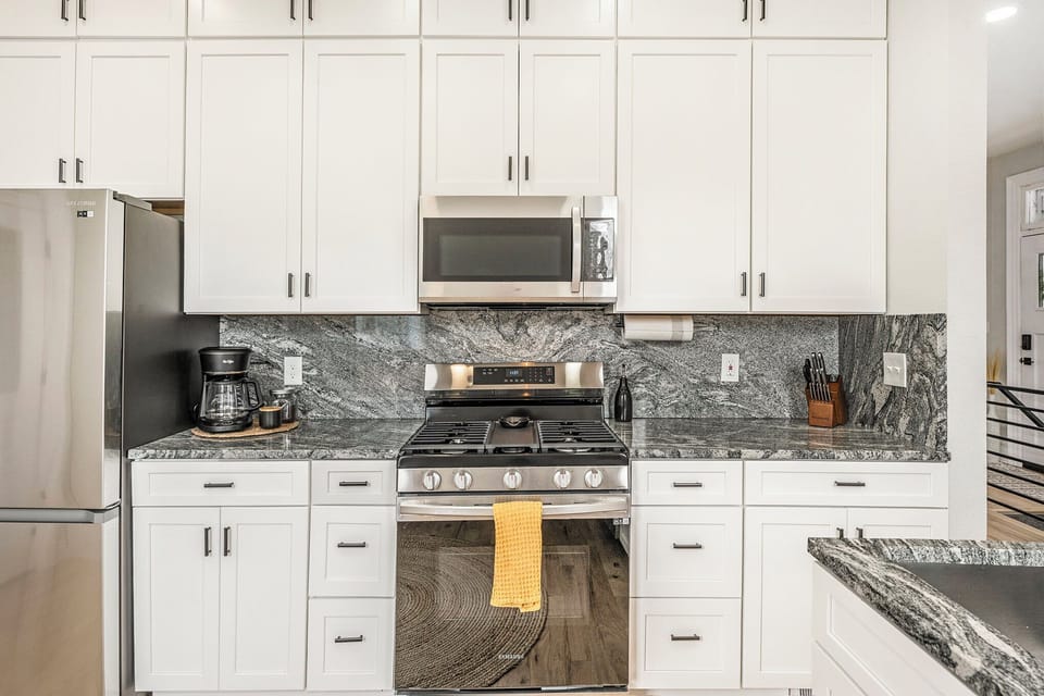 Our fully stocked kitchen is ready for you to whip up delicious meals with ease.