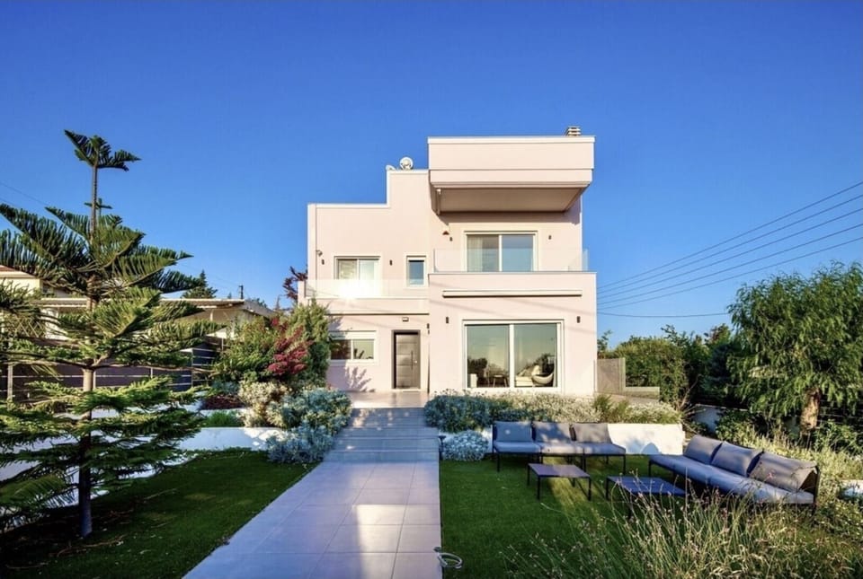 Front entrance, patio and garden