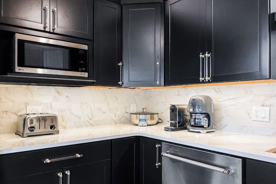 "Experience convenience and style with our well-equipped kitchen."

