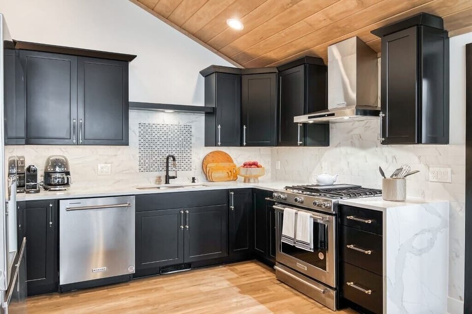 "Cook in a sleek and modern kitchen equipped with top-of-the-line appliances."

