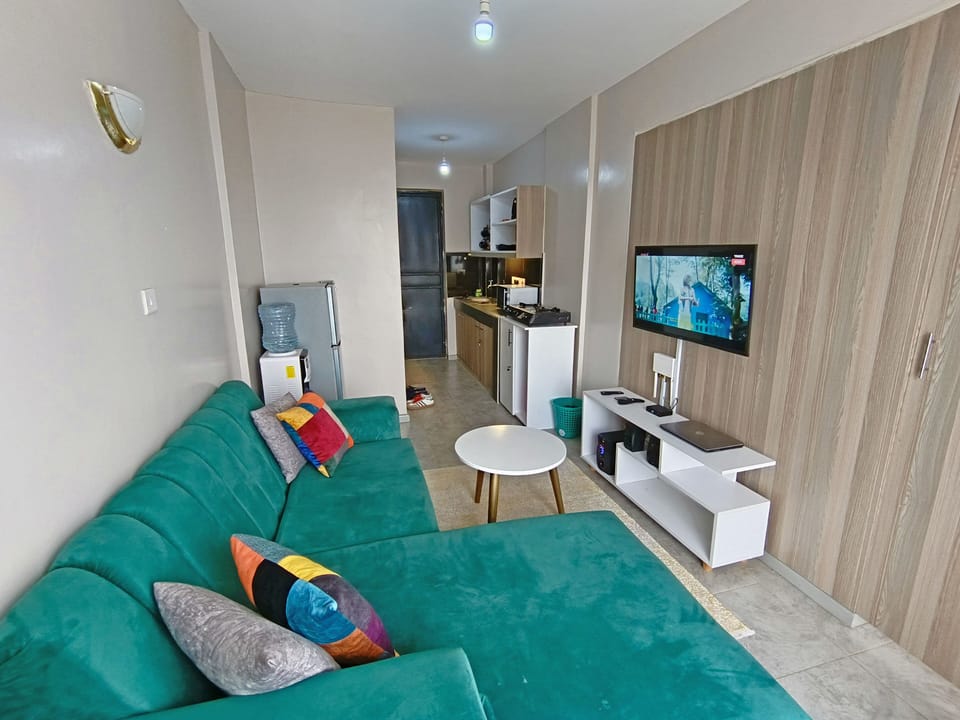 Modern 1BR apartment🌇with a panoramic city view in Nairobi.