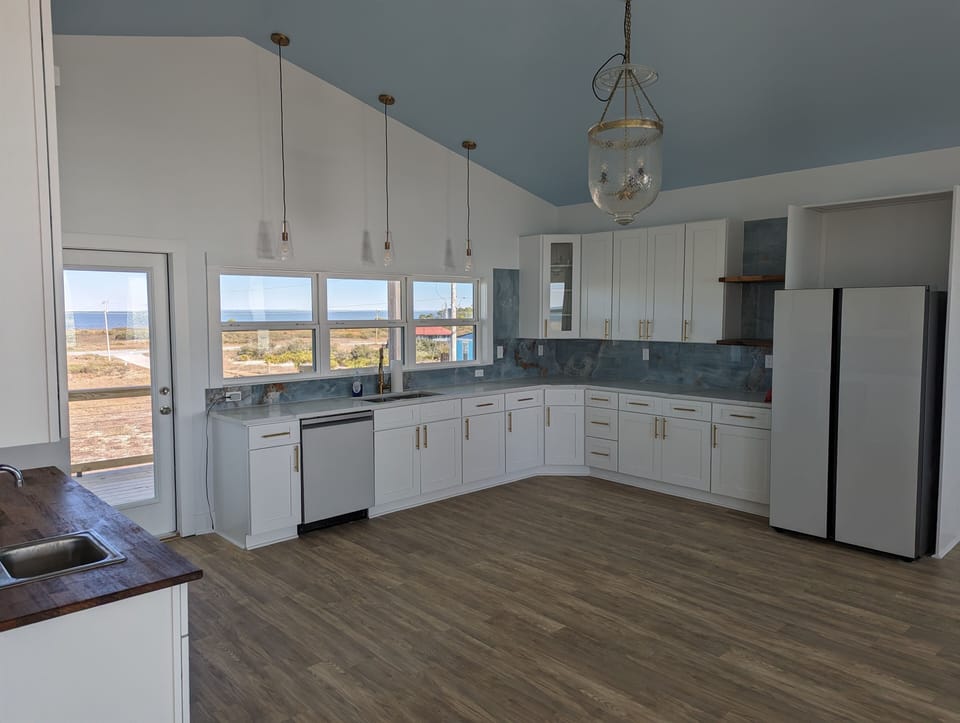 Large Kitchenette in the upstairs Living Area!  Full kitchen with Island down