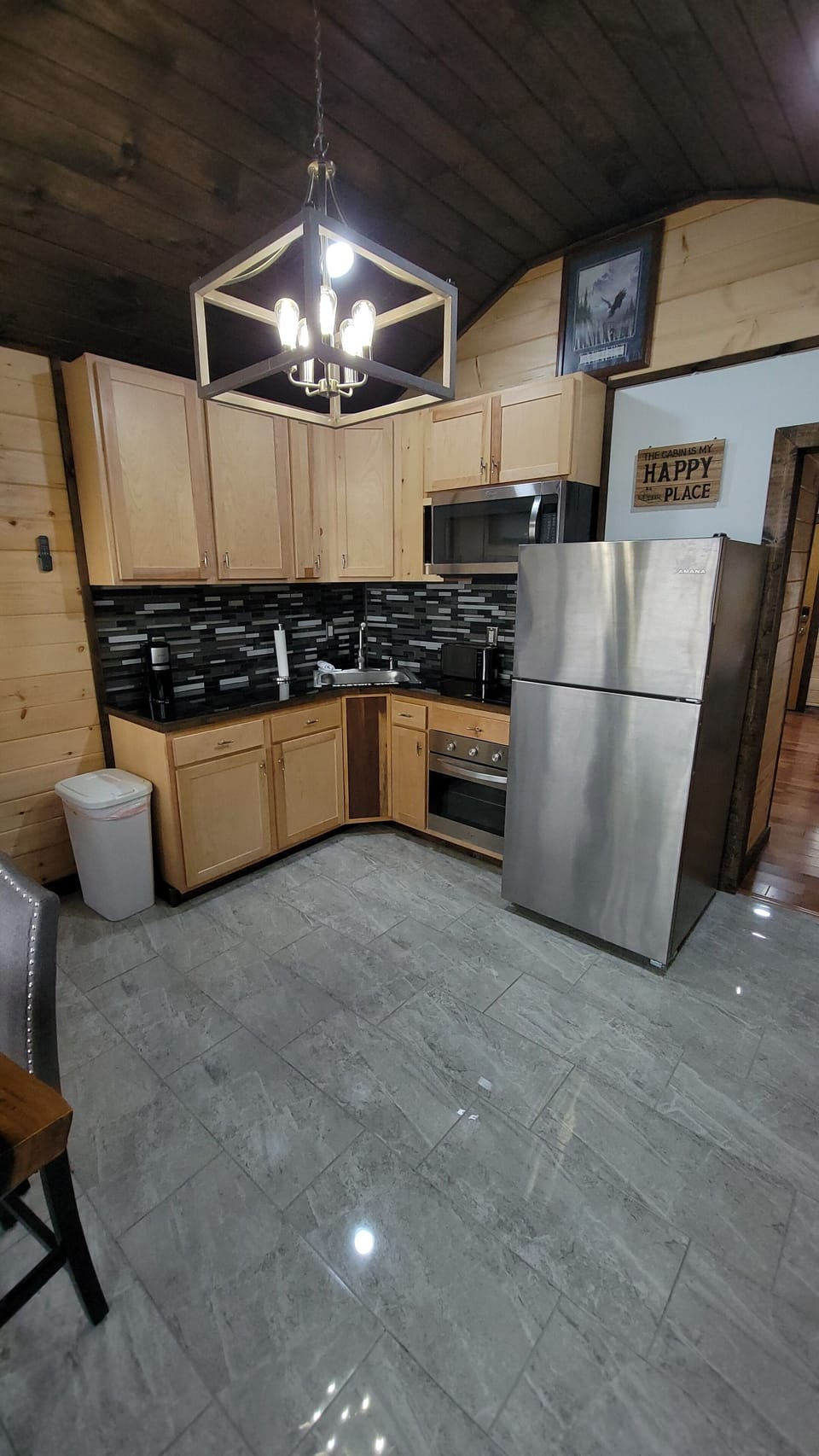 All cookware is provided and dishes, forks and spoons, salt and pepper paper tow