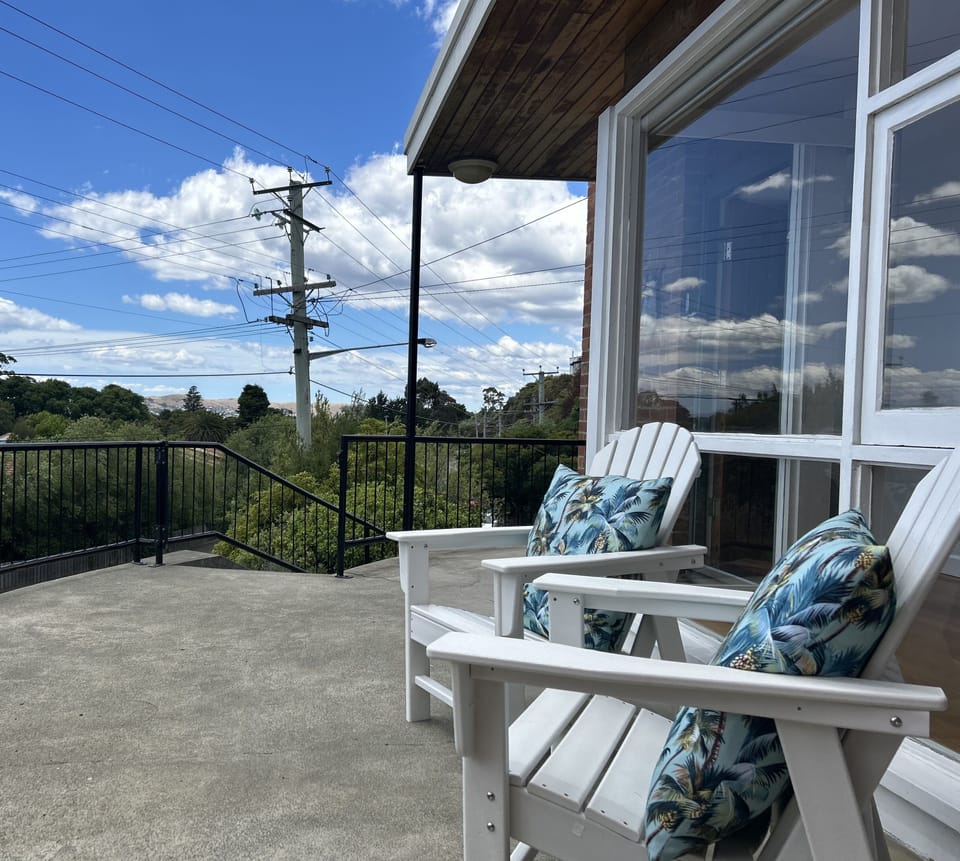 Dual cape cod chairs to soak up the sun and views