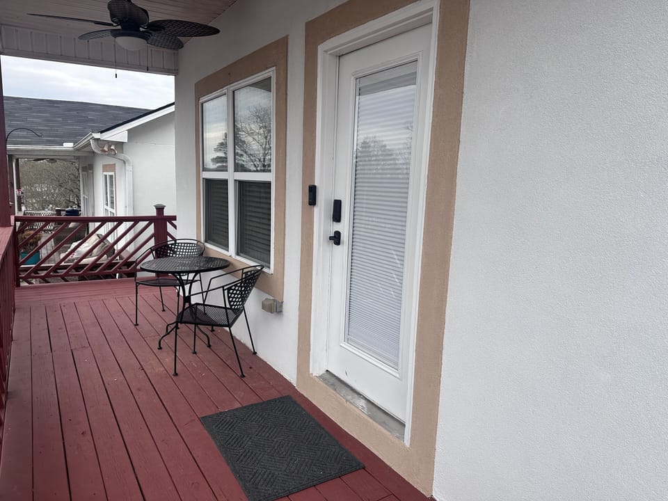 Covered porch that overlooks Lake Hamilton