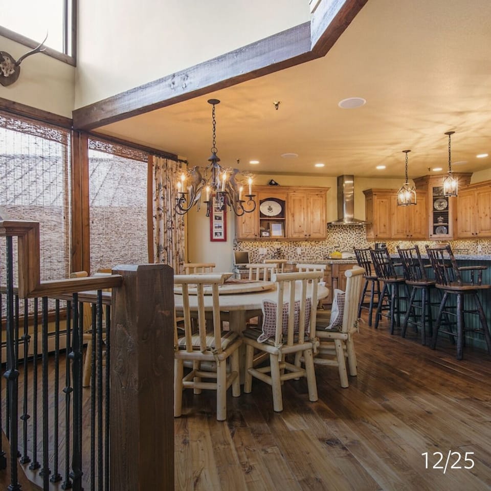 Large kitchen table that seats 10 and bar seating at the kitchen island