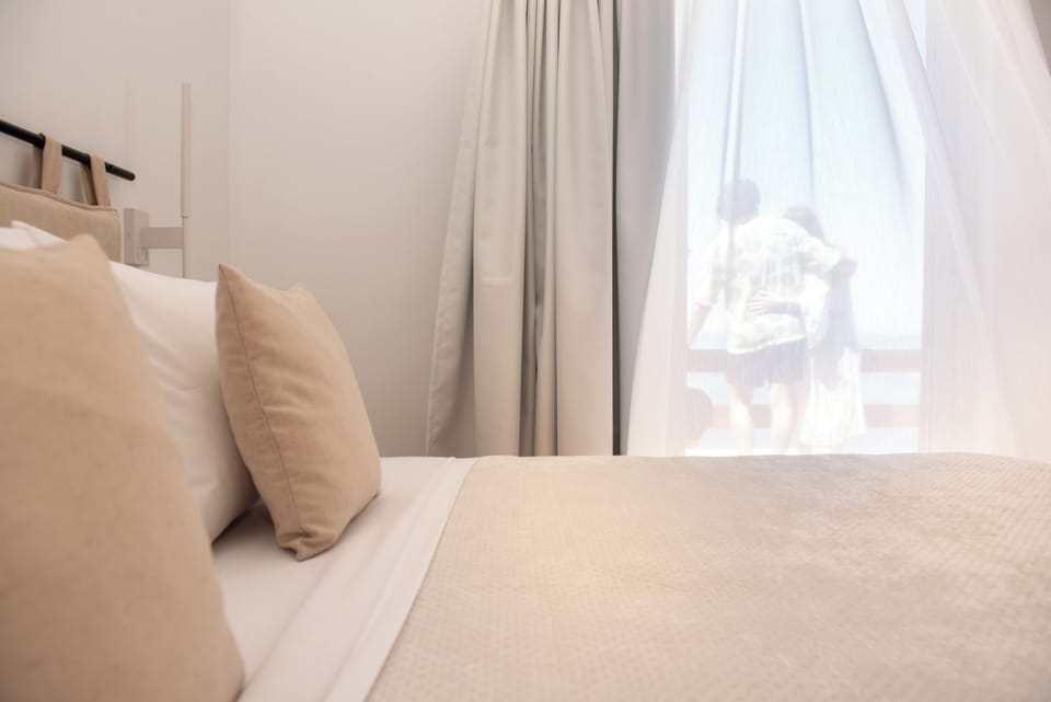 Rest easy in our queen-size bed, surrounded by modern comforts.