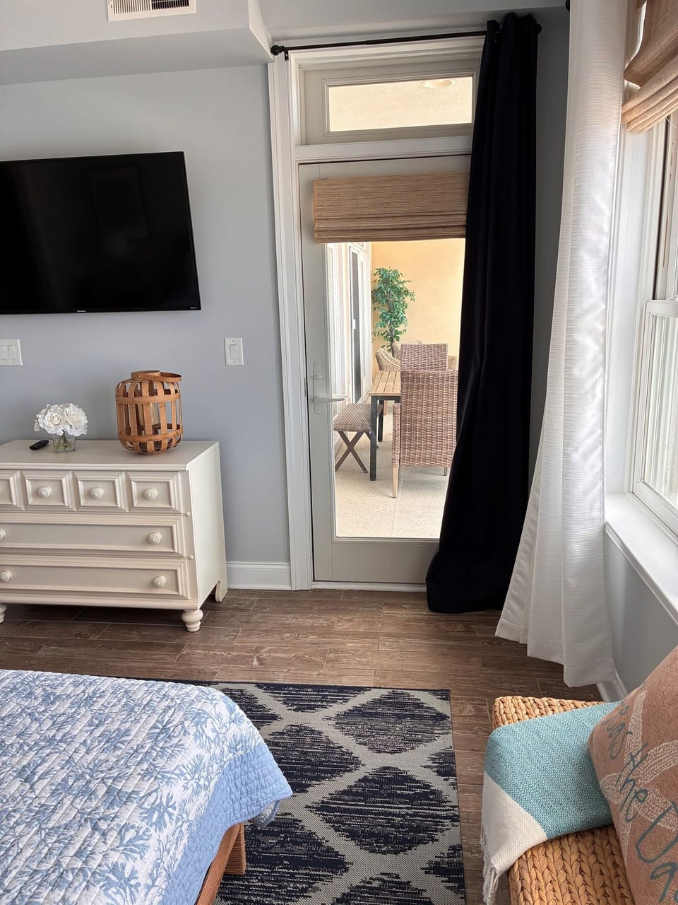 Primary ensuite bedroom with King Bed and access to outdoor balcony