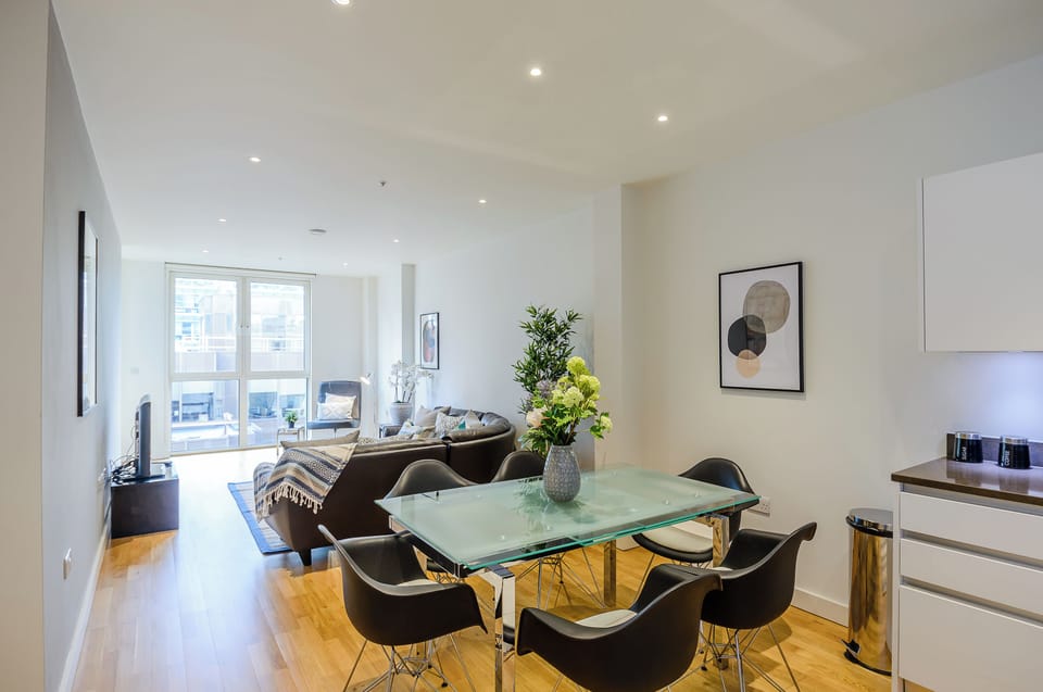 Spacious lounge with sofa, tv