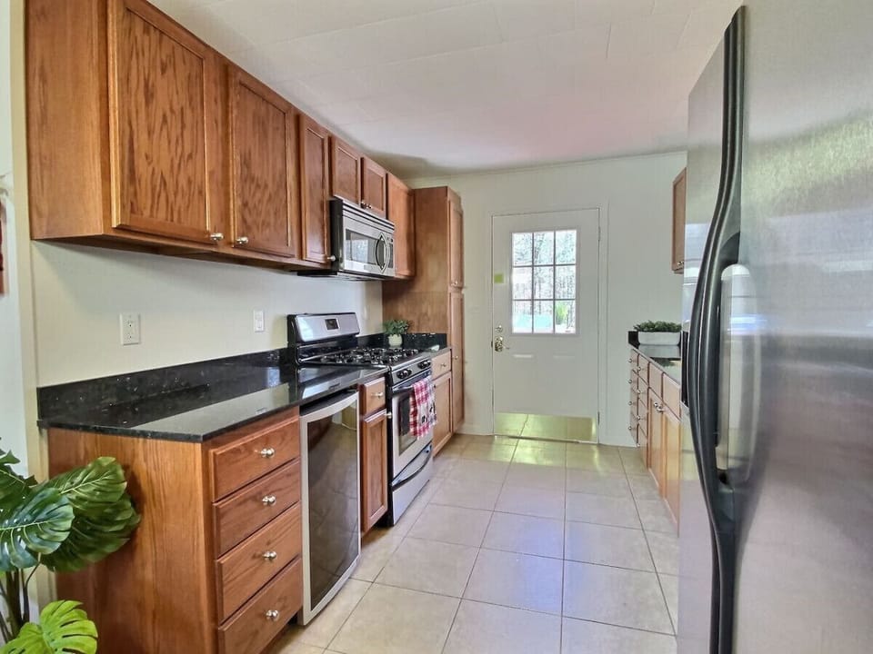 The kitchen, fully stocked, with everything that you may need for your stay.