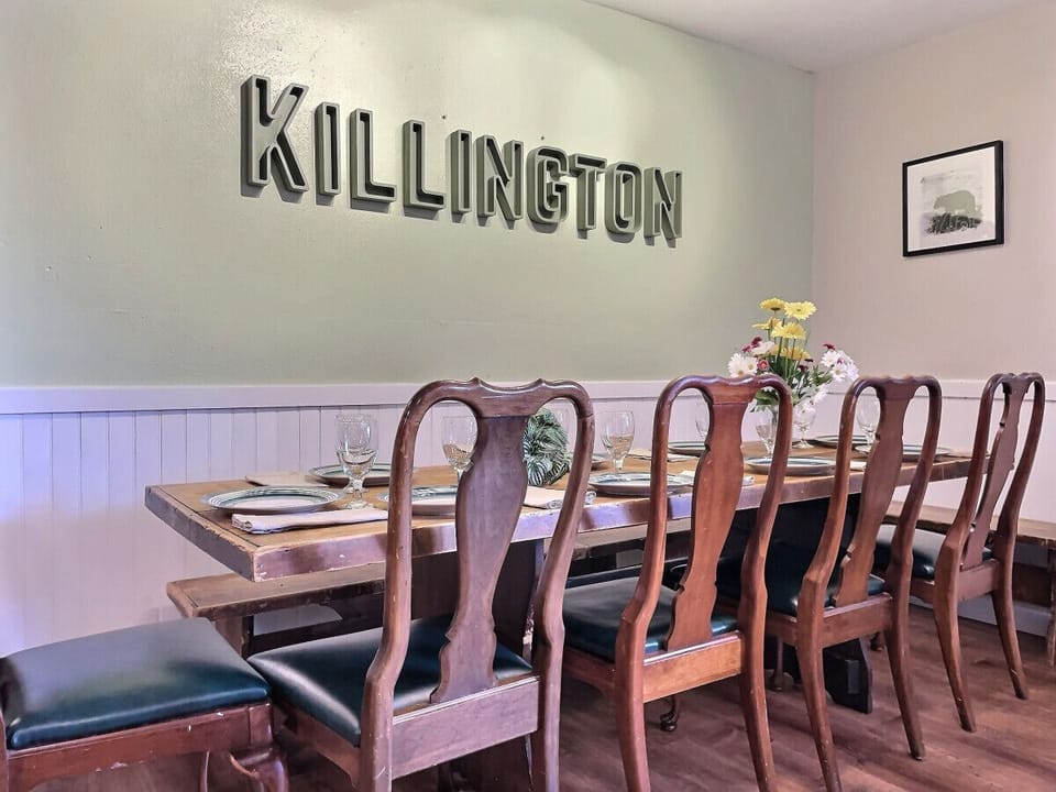 Dining area featuring a wall sign of Killington for a local touch.