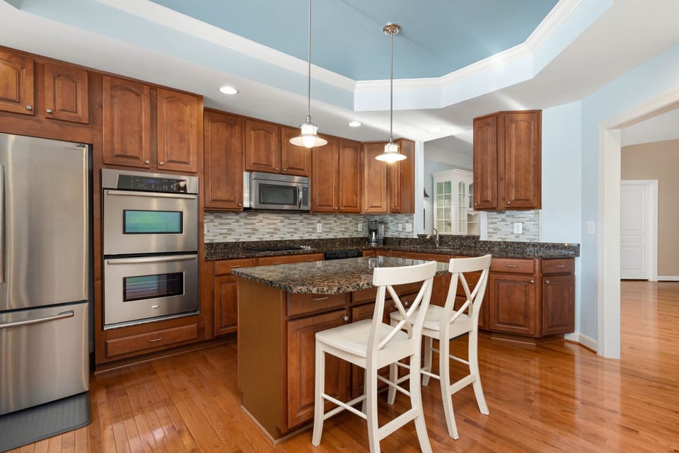 Bar seating in the kitchen area.  Great for entertaining.