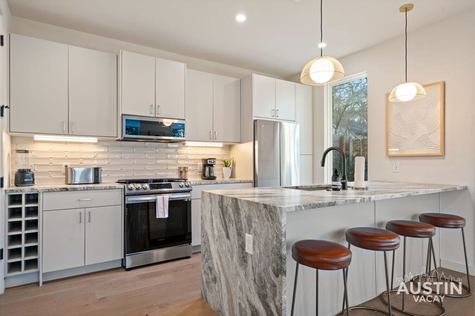 Whip up meals with a modern stove and sleek, stainless steel appliances.Whip up meals with a modern stove and sleek, stainless steel appliances.