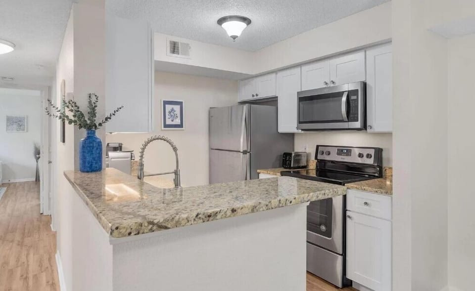 Modern Kitchen With Stainless Steel Appliances