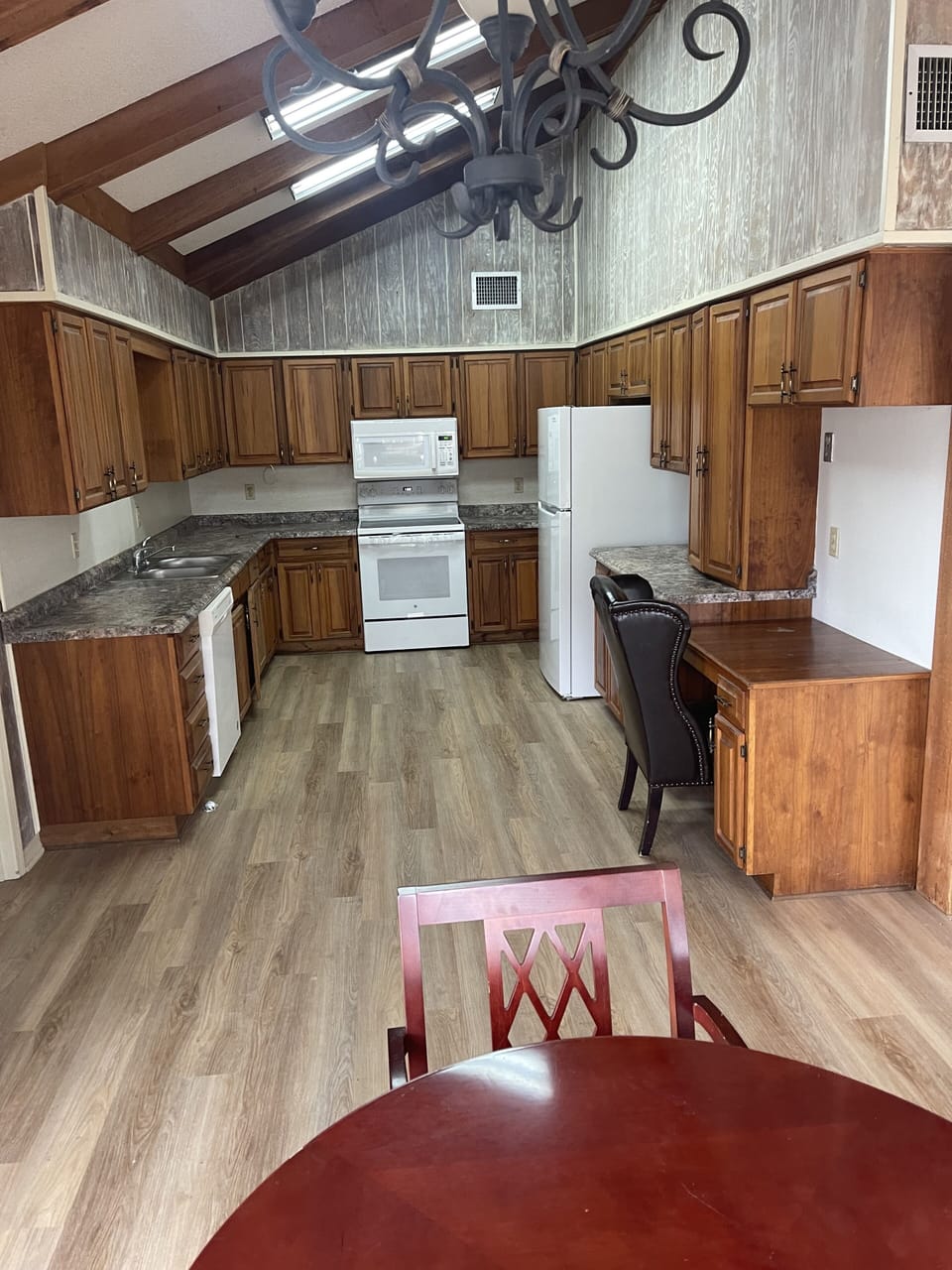 Kitchen features brand new fridge and range.