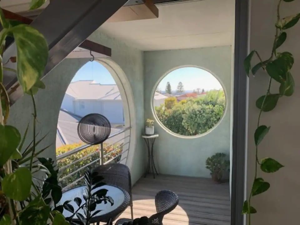 Balcony circle windows to the world