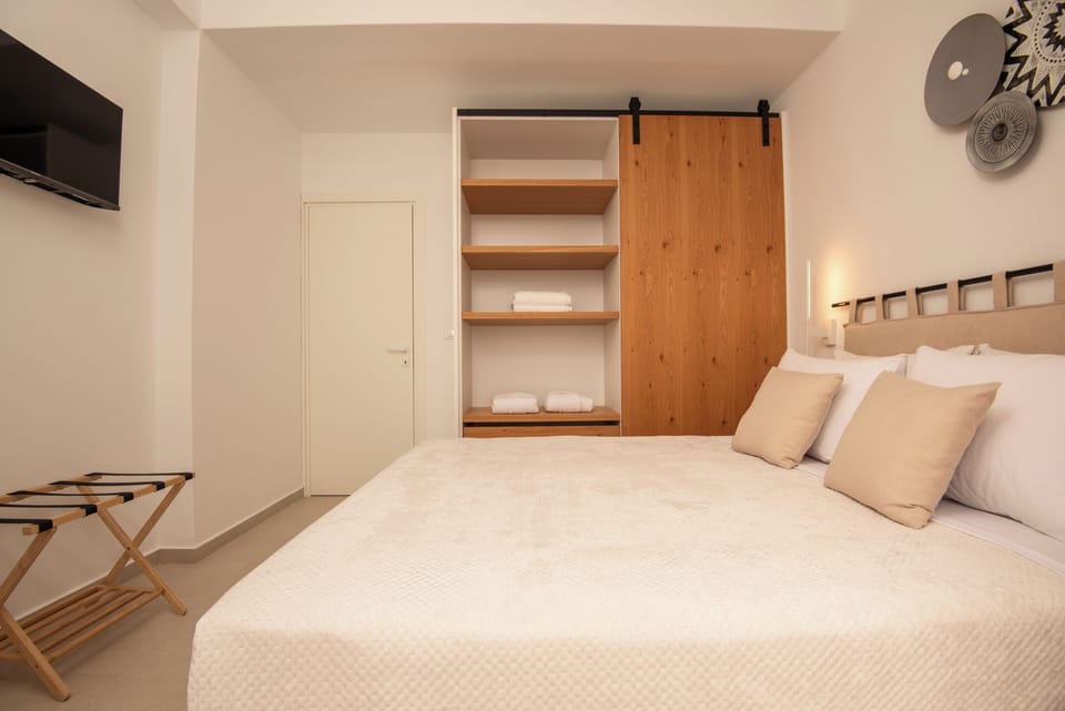 Rest easy in our queen-size bed, surrounded by modern comforts.