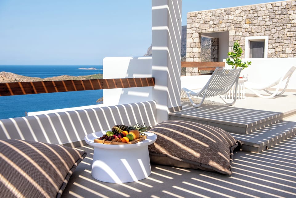 Lounge on plush floor pillows or the cozy sofa.