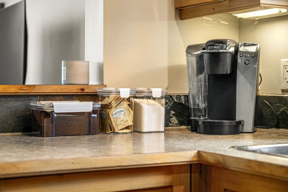 Full kitchen with a blender, drip & Keurig coffee maker, ground coffee, tea, sugar, and basic condiments (ketchup, mustard & relish.)
