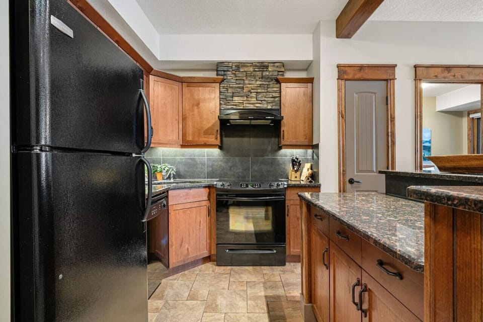 Full kitchen with all the essentials plus two coffee makers (Drip & Nespresso), a blender, and a crockpot/slow cooker. We also stock the unit with ground coffee, sugar, tea, ketchup, mustard & relish.