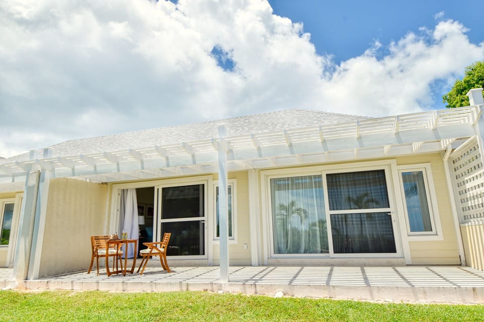 Outdoor patio with cozy furniture, ideal for coffee mornings or wine evenings.