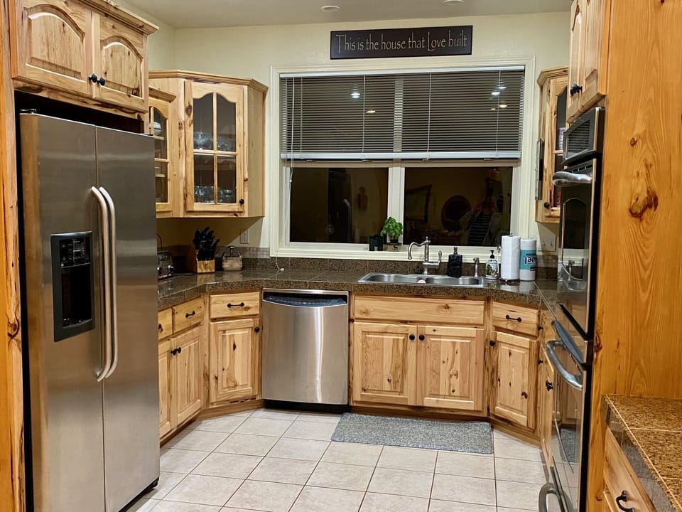 Kitchen with full size refrigerator