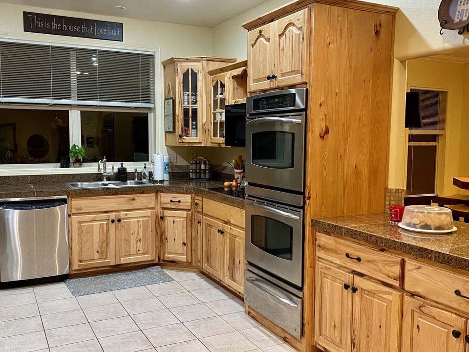 Kitchen with double oven/stove top/dishwasher