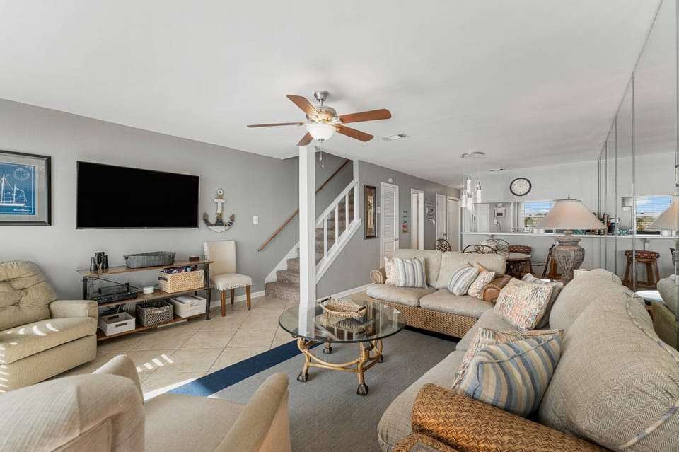 Spacious living room with access to the upstairs